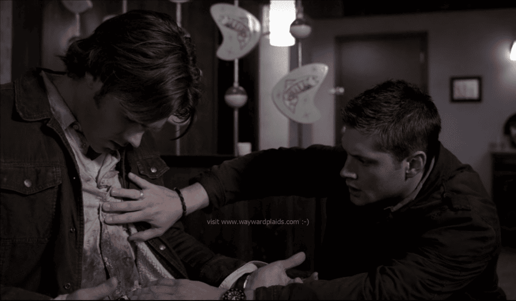 This is a very rare shirt. I looked for it for years because of the soft soft visual of Dean taking care of Sam all bloody in it. But it's not Sam at all, it's Meg, possessing Sam. It has diamond snaps but the stone inside the diamond is a circle, it's a very unusual...